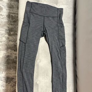 Lululemon Gray Wundertrain 25” yoga pants Size 4